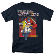 Navy short-sleeved t-shirt featuring Optimus Prime holding a cannon over a red grid background with the text 'Transformers' in silver above him.