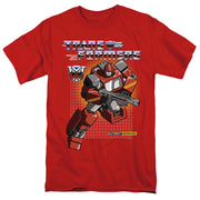 Red short-sleeved t-shirt featuring Autobot Ironhide robot aiming a blaster, with 'Transformers' logo above it.