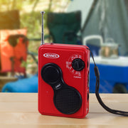 Red Jensen portable AM/FM weather band radio with silver telescoping antenna, black tuning dial, speaker grille, and LIGHT button, with black wrist strap.