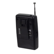 Back view of black Jensen pocket radio with extended silver telescoping antenna, belt clip, and FCC logo on label.