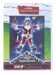 Front of the VHS-style Christmas Vacation puzzle box showing the poster artwork and a red bottom band reading 300 Puzzle, 8.3in x 11.4in.