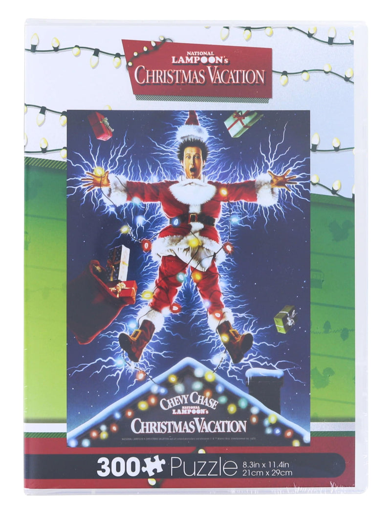Front of the VHS-style Christmas Vacation puzzle box showing the poster artwork and a red bottom band reading 300 Puzzle, 8.3in x 11.4in.