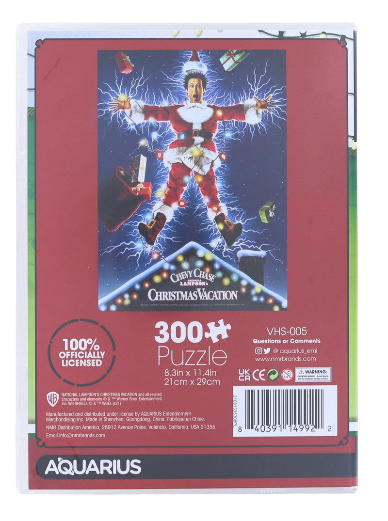 Back of the Christmas Vacation puzzle box showing a smaller copy of the poster, a 100% officially licensed seal, and a barcode.