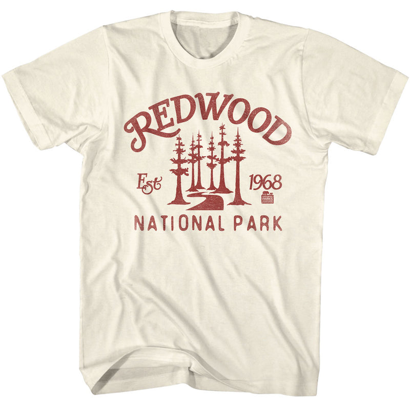 Cream short-sleeve t-shirt with red graphic of tall redwood trees, 'REDWOOD' arched above, 'EST 1968' and 'NATIONAL PARK' below.