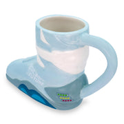 Angled view of light blue and white ceramic Marty's shoe mug featuring the text 'BACK TO THE FUTURE' in white on the side near the toe.