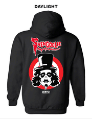 Animated back view of black glow-in-the-dark hoodie featuring red Svengoolie script logo above face illustration on red and white target rings and a white MeTV logo below