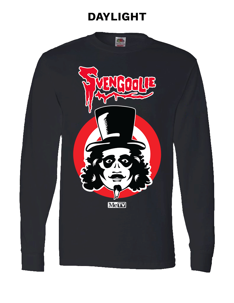 Animated glowing black long-sleeve shirt with red Svengoolie script logo above face illustration on red and white target rings and white MeTV logo below