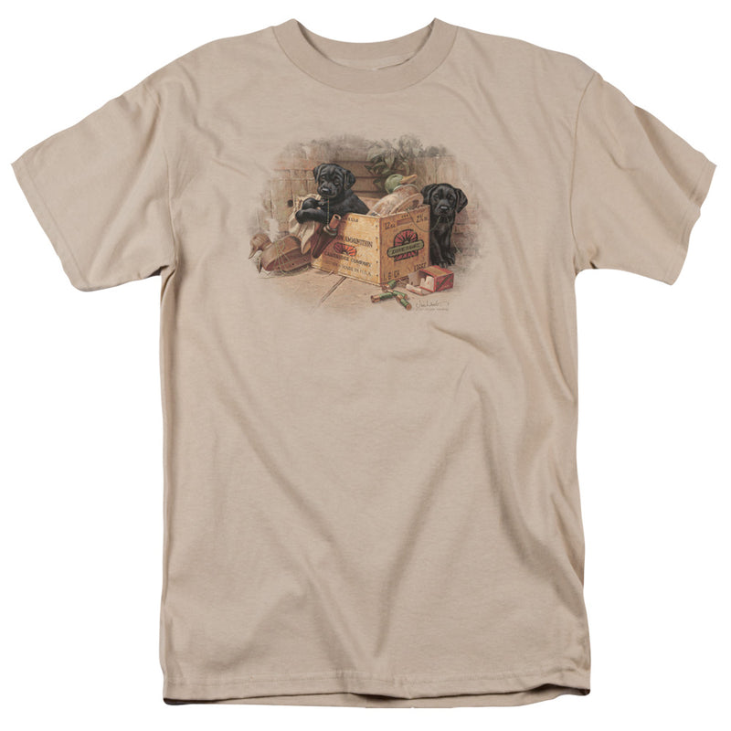 Sand t-shirt with illustration of two black Lab puppies beside a wooden crate and a small red box, plus a duck