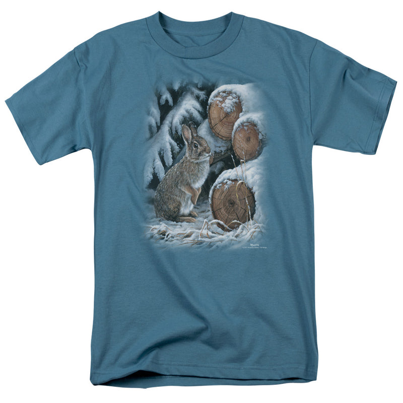 Slate blue short-sleeve t-shirt with a painted print of a brown cottontail rabbit beside snow-covered logs and snowy evergreen branches