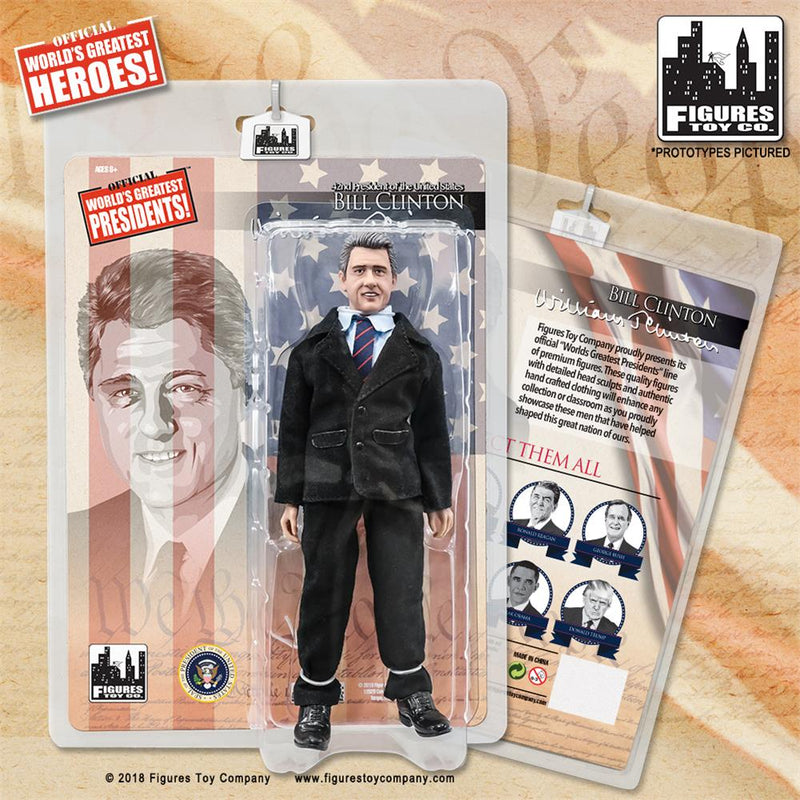 Bill Clinton figure in black suit, white shirt, and striped tie, in package labeled "WORLD'S GREATEST PRESIDENTS!".
