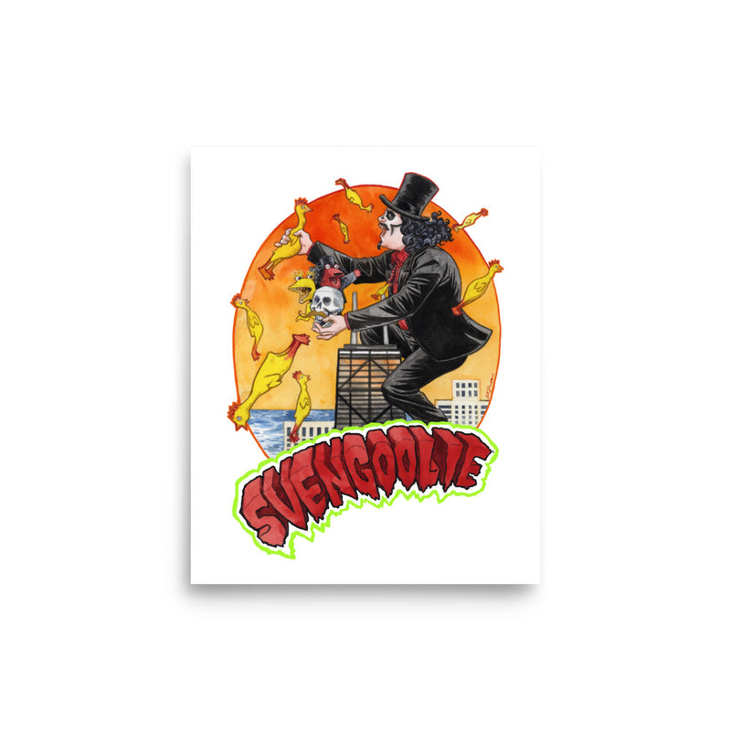 Cartoon art print of Svengoolie in top hat and black suit, at the top of a skyscraper, holding a skull, surrounded by rubber chickens, with 'SVENGOOLIE' in red letters over an orange sunset city.