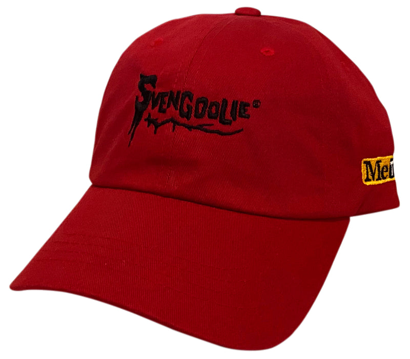 Angled view of Red baseball cap with red embroidered Svengoolie logo on front and MeTV Logo on side