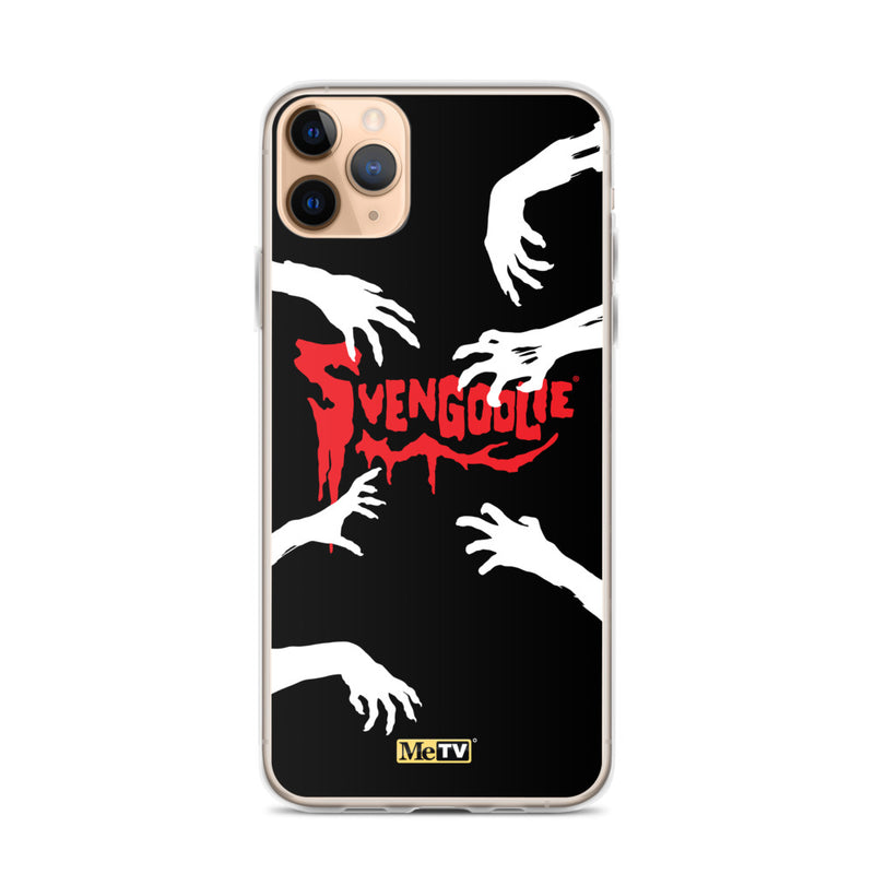 Black iPhone case with white zombie hands reaching inward around red dripping "Svengoolie" logo, plus small yellow "MeTV" badge at bottom.