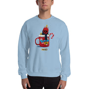 Light blue crew neck sweatshirt with graphic of a red puppet in a red mug with white whipped cream, and text "Toon In with Me" and "MeTV".