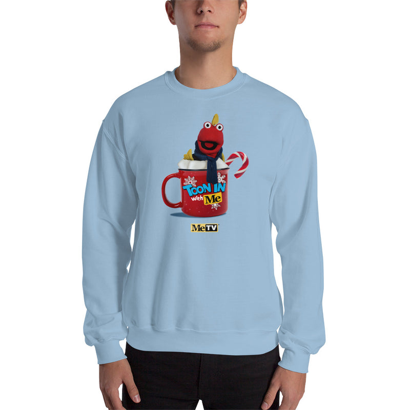 Light blue crew neck sweatshirt with graphic of a red puppet in a red mug with white whipped cream, and text "Toon In with Me" and "MeTV".