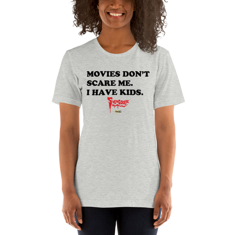 Heather gray t-shirt with black text reading 'MOVIES DON'T SCARE ME. I HAVE KIDS.' and a red Svengoolie logo with a MeTV logo below.