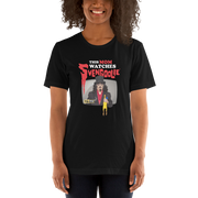 Model wearing Black t-shirt featuring Svengoolie holding a rubber chicken with the text 'This Mom Watches Svengoolie' in black and red above it.