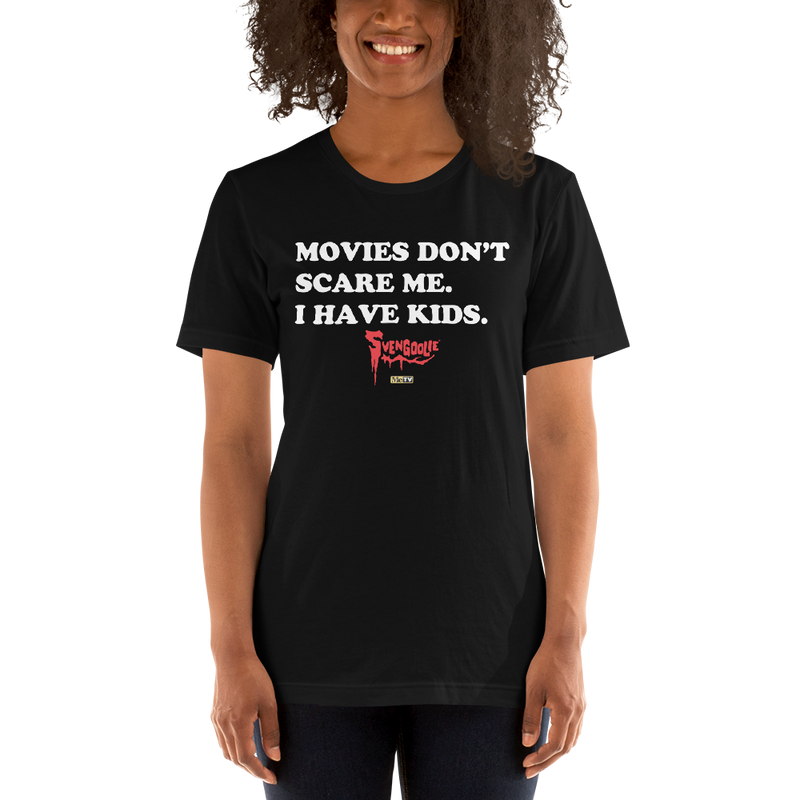 Black t-shirt with white text reading 'MOVIES DON'T SCARE ME. I HAVE KIDS.' and a red Svengoolie logo with a MeTV logo below.