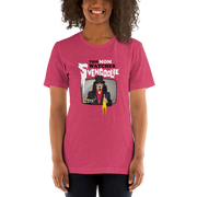Model wearing pink t-shirt featuring Svengoolie holding a rubber chicken with the text 'This Mom Watches Svengoolie' in black and white above it.
