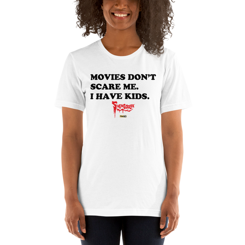White t-shirt with black text reading 'MOVIES DON'T SCARE ME. I HAVE KIDS.' and a red Svengoolie logo with a MeTV logo below.