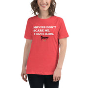 Heather red women's t-shirt with white text reading 'MOVIES DON'T SCARE ME. I HAVE KIDS.' and a black Svengoolie logo with a MeTV logo below.