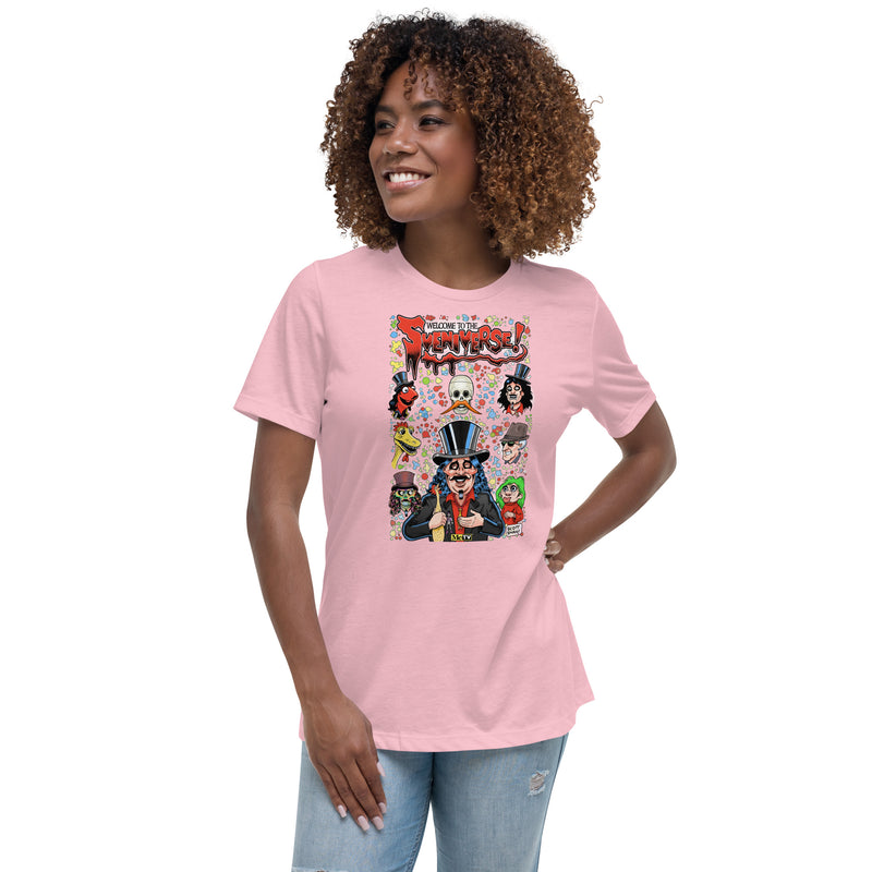 Light pink women's t-shirt with graphic reading 'Welcome to the Sveniverse!' with Svengoolie, Kerwyn, Sventoonie, and other cartoon caricatures on a colorful bubble background; with Scott Shaw watermark included.